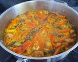 Foto del paso 4 de la receta: Arroz con pollo, mini-albóndigas y alcachofas