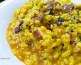 Foto del paso 8 de la receta: Arroz meloso de pota al ajillo con alga dulce
