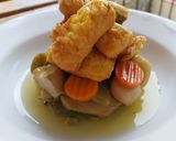 Foto del paso 11 de la receta: Menestra en escabeche con tacos de merluza a la romana