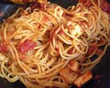 A picture of step 5 of 15 Minute Chicken Pasta in a Garlic Tomato Sauce.