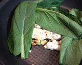 A picture of step 3 of Stir Fried Chicken and Leafy Greens.