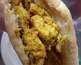 A picture of step 7 of Chicken Tikka Pita Pockets.