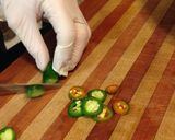 A picture of step 1 of Super Spicy Pickled Jalapeños.