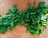 A picture of step 3 of Scallion Pancakes ("Chijimi") with spicy dipping sauce.
