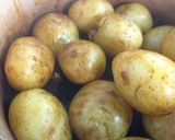 A picture of step 4 of Braised New Potatoes.