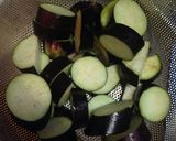 A picture of step 1 of Chunky Eggplant and Black Olive Tapenade .