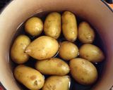 A picture of step 1 of Steamed Potatoes with Dill Butter.