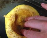 A picture of step 2 of Cumin Rubbed Roasted Acorn Squash with Sage Garlic Butter.