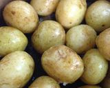 A picture of step 3 of Braised New Potatoes.