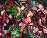 A picture of step 3 of Sautéed Beet Greens with Garlic and Bacon.