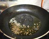 A picture of step 1 of Garlic fried rice.
