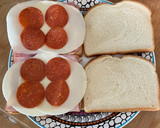 A picture of step 2 of Proper School Lunch Pepperoni Ham and Cheese Sandwich.