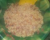 A picture of step 3 of Indomie pizza.