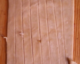 A picture of step 7 of Potatoe curl rolls.