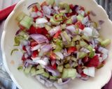 A picture of step 5 of Kachoomar Salad.