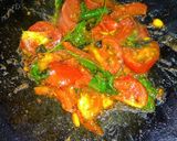 A picture of step 1 of Tawa fry tomato.