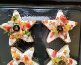 A picture of step 2 of Kids special star pizza.