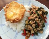 A picture of step 6 of Pad Krapow with Ground Pork and Crispy Fried Egg.