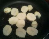 A picture of step 2 of Pan-fried Potatoes and Sardines with Garlic and Cheese .
