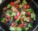 A picture of step 5 of Mackerel, Broccoli and Garlic Stir-Fry.