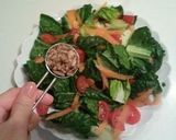 A picture of step 2 of Green Salad with Walnuts.