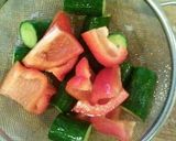 A picture of step 2 of Cucumbers and Sweet Red Pepper Pickles.