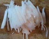 A picture of step 1 of Daikon Radish and Wakame Stem Salad with Sweet Miso.