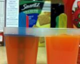 A picture of step 2 of Strawberry Kiwi Popsicles.