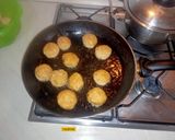 A picture of step 6 of Bread Meatballs in Tomato Sauce.