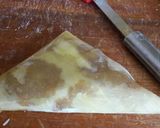 A picture of step 8 of Spicy beef triangles.