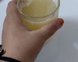 A picture of step 1 of Sunshine Sparkler or Moushambi mocktail.