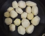 A picture of step 1 of Dum aloo.