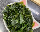 A picture of step 2 of Cucumber wakame seaweed salad.