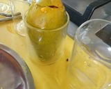 A picture of step 3 of Ice cream loaded mango.