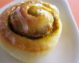 A picture of step 8 of Halloween Pumpkin Cinnamon Roll.