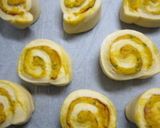 A picture of step 6 of Halloween Pumpkin Cinnamon Roll.