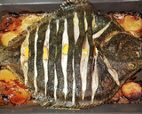 Foto del paso 7 de la receta: Rodaballo salvaje al horno con guarnición de patatas y cebolla