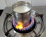 A picture of step 1 of Curd from milk.
