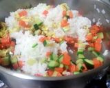 A picture of step 6 of fry rice Mexican style.