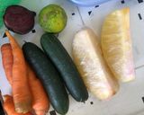 A picture of step 1 of Pineapple, cucumber, carrot beet salad.