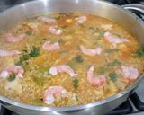 A picture of step 11 of Seafood Paella with Brown Rice.