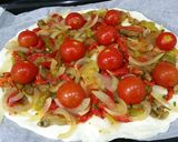 A picture of step 1 of Vegetarian pizza with roasted peppers and cherry tomatoes.