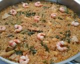 A picture of step 12 of Seafood Paella with Brown Rice.