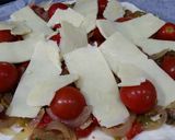 A picture of step 2 of Vegetarian pizza with roasted peppers and cherry tomatoes.
