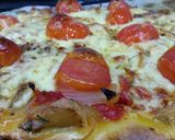 A picture of step 4 of Vegetarian pizza with roasted peppers and cherry tomatoes.