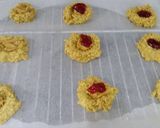 A picture of step 5 of Easy oat cookies with raspberry jam and peanut butter filling.