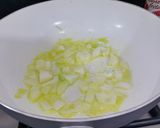 A picture of step 2 of Herby cheese, egg and tomato scramble.
