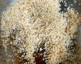 A picture of step 3 of Coconut Laddu.