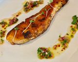 A picture of step 9 of Grilled salmon served with homemade chimichurri sauce.