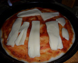 Foto del paso 13 de la receta: Pizza de muzzarella y aceitunas